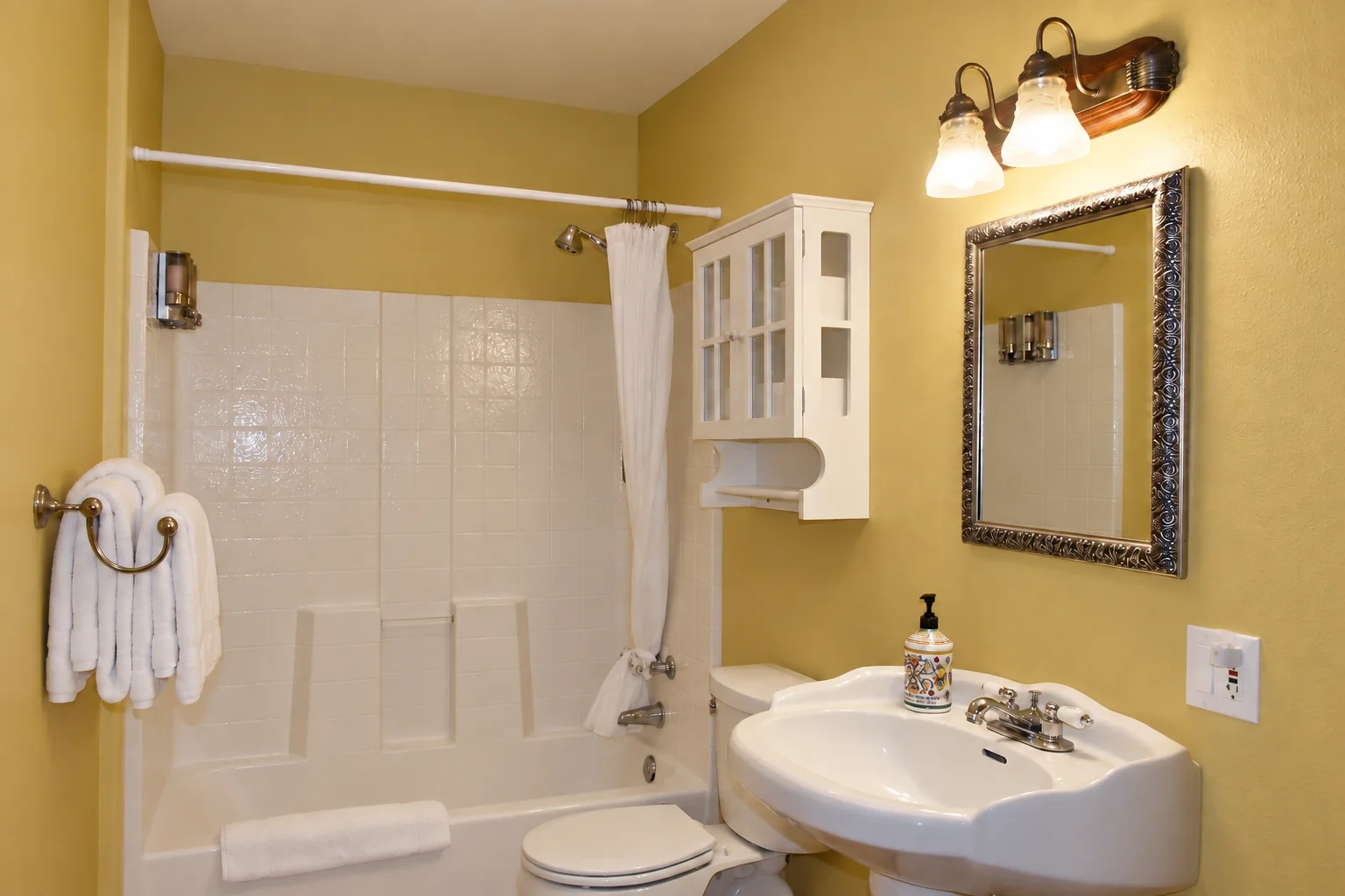 Private bathroom with bathtub and shower in Victorian Room