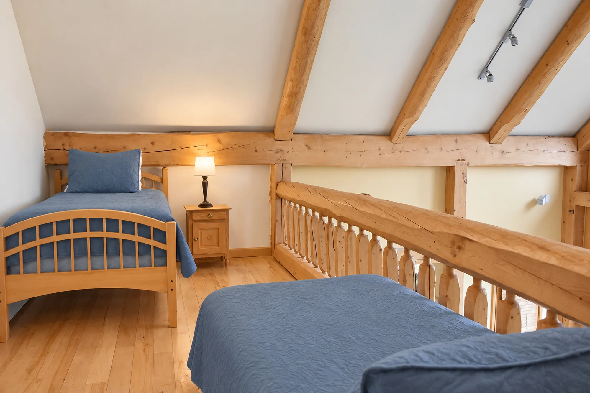 Twin beds in the loft of Denali View Suite