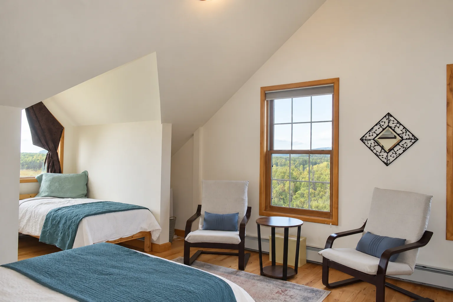 Seating area and beds in Mt. Hunter Room
