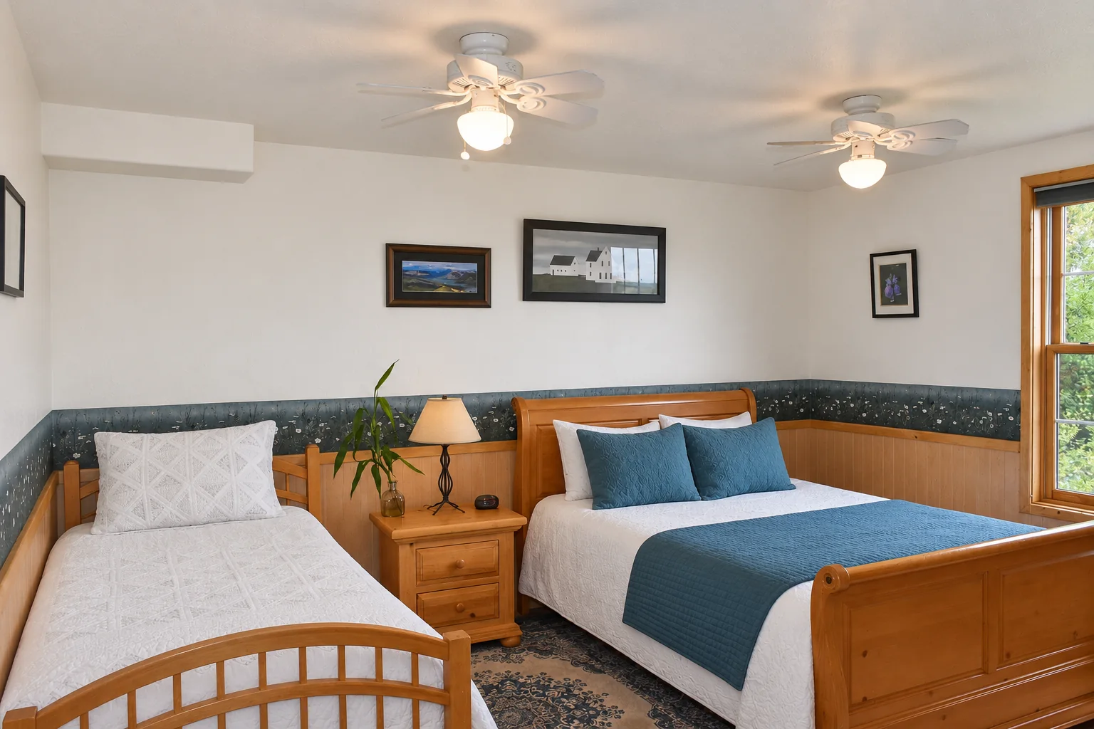 Queen and twin beds in Summer Solstice Room at Denali Overlook Inn
