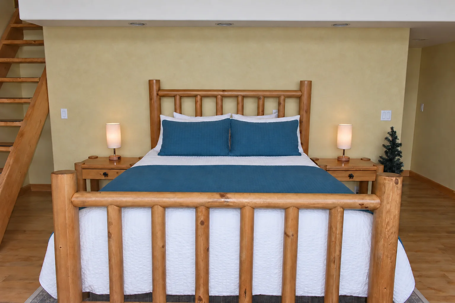 Queen bed in Denali View Suite