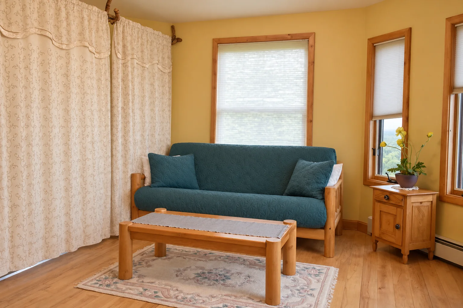 Futon seating and sleeping area in Denali View Suite